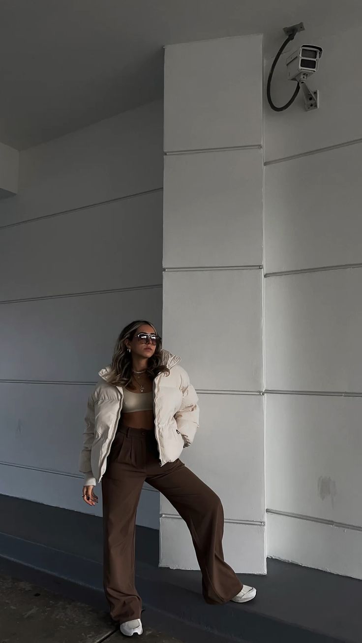 White Puffer Jacket with Brown Pants